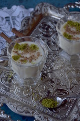 milky dessert in a glass, sahlep