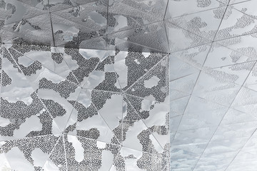 Abstract background of black shiny metalic polygonal shapes