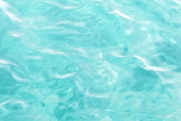 Underwater scenery, deep blue water of the ocean, air bubbles, waterline splitting skyline, divers discovering sea