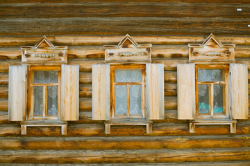 Window in wooden houses near the Lake Baikal in Siberia in Russia