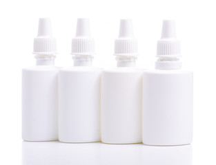 Fototapeta na wymiar White bottles nose spray on white background isolation