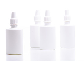 White bottles nose spray on white background isolation