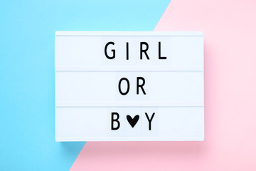 Lightbox with words Girl or Boy on colorful background