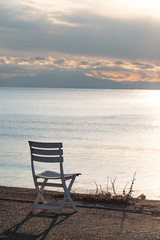 wooden chair on the beach