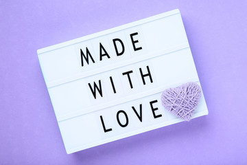 Lightbox with words Made With Love on purple background