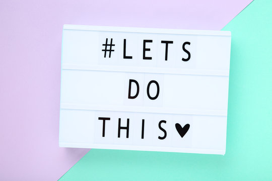 Naklejki Lightbox with words Lets Do This on colorful background