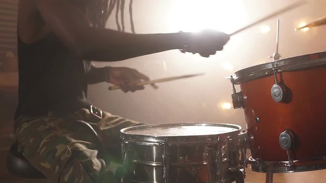 Crazy afro guy is keen on rock music. Strong music. Interest concept