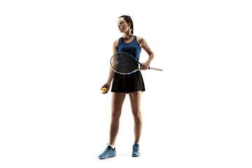 Full length portrait of young woman playing tennis isolated on white background. Healthy lifestyle. The practicing, fitness, sport, exercise concept. The female model in motion or movement