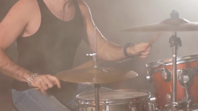 Rock musician on the stage. Free and spare time. Emotion, craziness