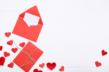 Valentine hearts with envelopes on white background