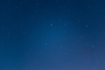 Long exposure night sky stars photo. A lot of stars with constellations. Far from the city. Night landscape.