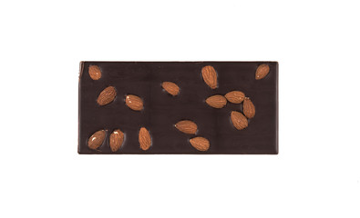 dark chocolate background with almond nuts