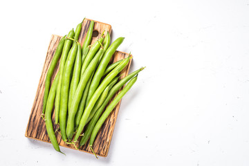 Green beans on white background. 