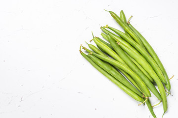 Green beans on white background. 