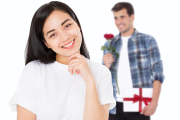 Valentine day. Boyfriend with flowers and gift box. Beautiful asian girl with healthy skin isolated on white background. Young korean woman smiling white health teeth.