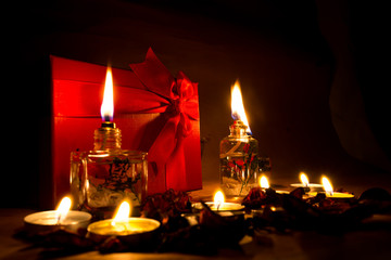 Beautiful candles and gifts burning on Valentine's Day