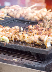 Meat roasting on a barbecue