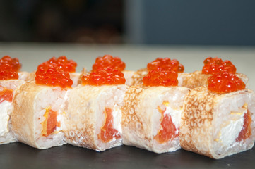 Overhead japanese sushi food. Maki ands rolls with tuna, salmon, shrimp, crab and avocado. Top view of assorted sushi, all you can eat menu. Rainbow sushi roll, uramaki, hosomaki and nigiri.