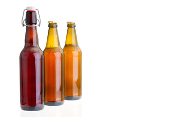 Row of beer bottles isolated on white background