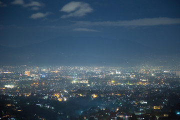 Aerial Night City Panoramic View of Bandung Cityscape, West Java, Indonesia