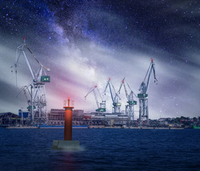 midnight on a cargo port with crane