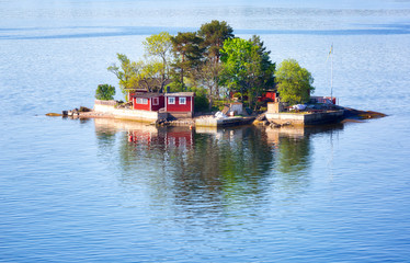 Finland, small houses on an island in the Baltic Sea