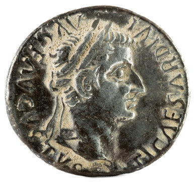 Ancient Roman silver denarius coin of Emperor Tiberius. Obverse.
