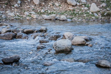 River flow. rocky river