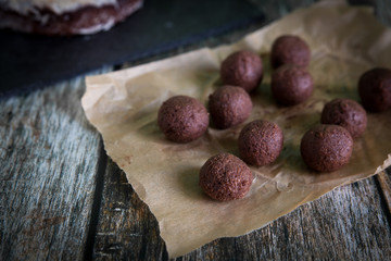 Preparing truffles from dark chocolate cake layer