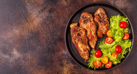 Roasted turkey steak with salad.