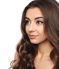 Naklejka premium Beautiful woman with shiny wavy hair on white background. Space for text