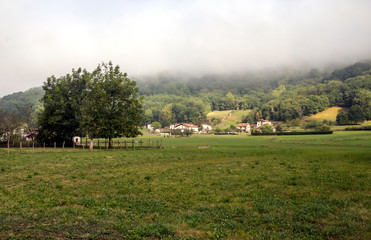 Fototapeta na wymiar Pyrenees mountains in Navarra in a cloudy day