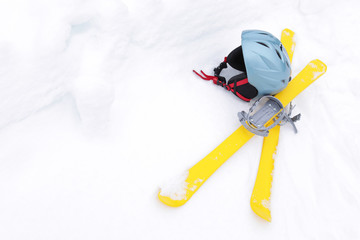 Ski equipment on snow, space for text. Winter vacation
