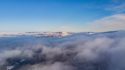Aerial landscape - Lago-Naki, clouds under mountains