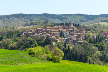 Fototapeta na wymiar San Casciano dei Bagni, one of the most beautiful villages of Italy. Beautiful areal landscape of a small rural village on the hill, Tuscany, Italy.