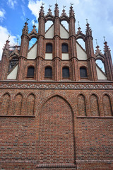 facade of a historic gothic church in Gdansk.