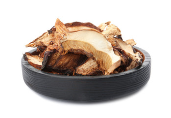 Plate of tasty dried mushrooms isolated on white