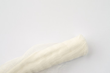 Fototapeta na wymiar Medical glove and bandage on a white background.