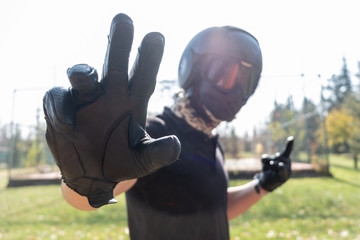 motorbiker showing arm to stop some action
