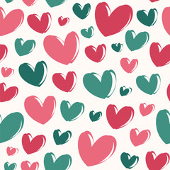 Seamless vector pattern with red and green hearts. 
