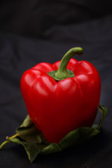 red pepper on a leaf