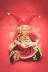 clown doll and mercury thermometer