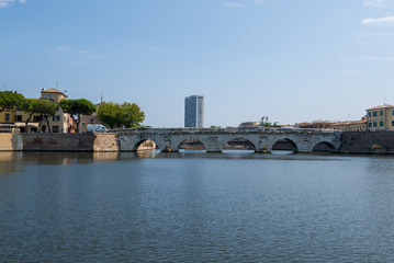 Fototapeta na wymiar Panoramic view of the Tiberius Bridge (Tiberius Bridge) in Rimini