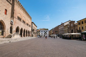 Tourists walking  on Cavour square in Rimini