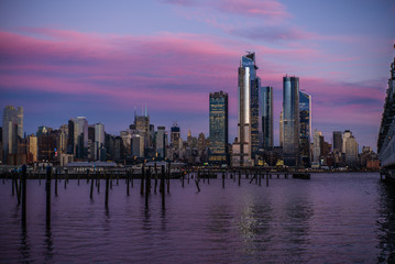 Fototapeta na wymiar Sunset on thw skyscrapers of Manhattan New York and the Hudson river in winter 3