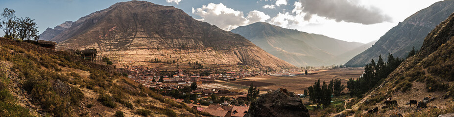 Pisac town between mountains panoramic view of the north zone in the inca's sacret valley of Peru. - obrazy, fototapety, plakaty