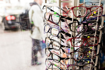 Fototapeta na wymiar Eyeglasses on shelf