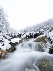 Plitvice lakes of Croatia (Hrvatska) - national park in winter  forest trees nature postcard waterfall