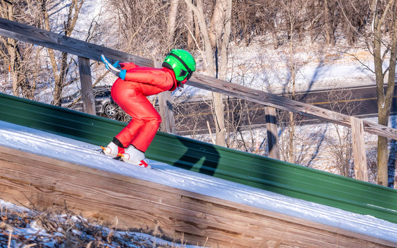 Young people are doing ski jump
