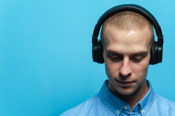 Portrait of a young handsome guy DJ